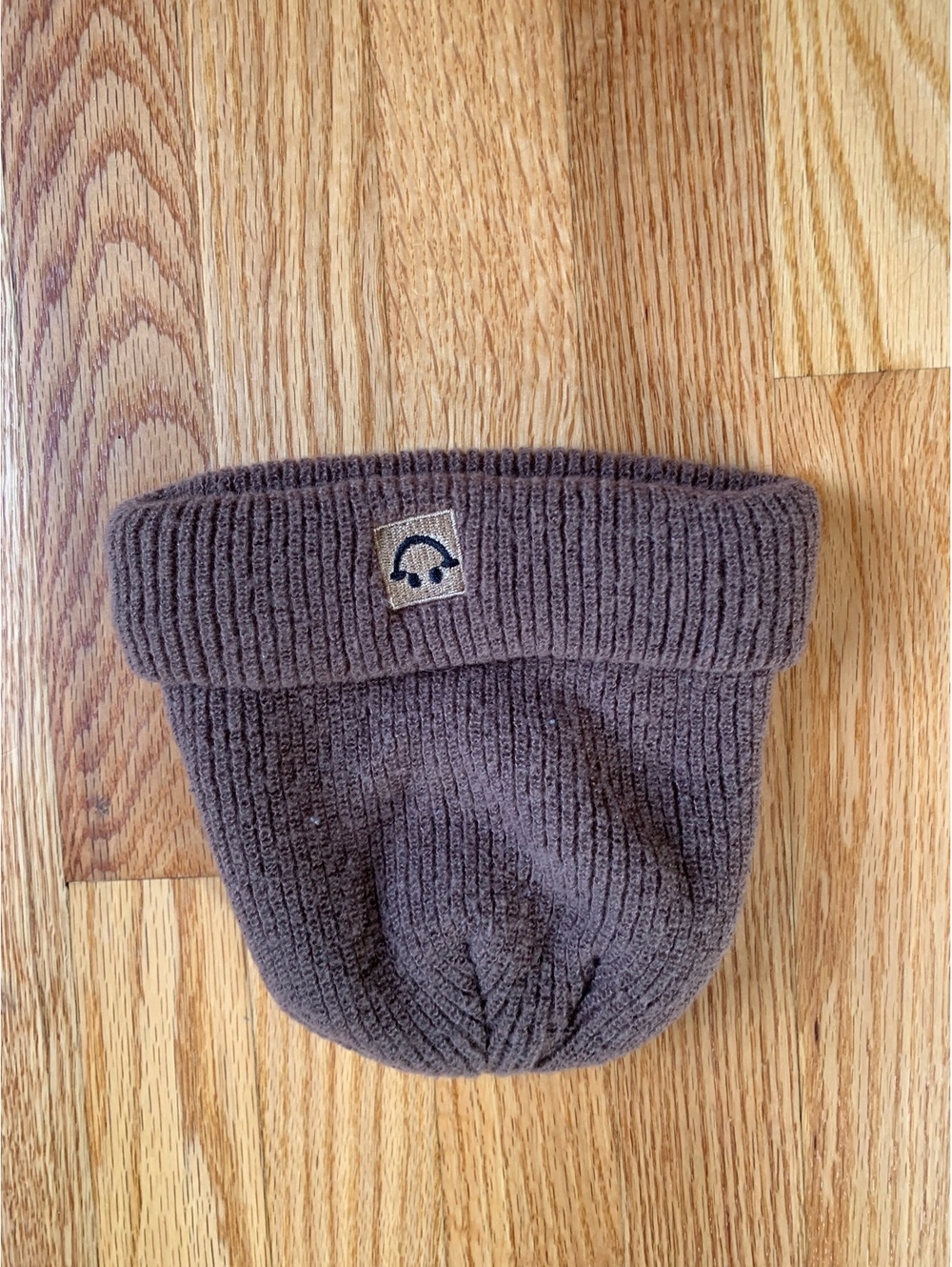 Brown knit beanie hat